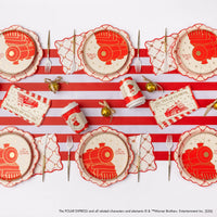 Polar Express party collection flat-lay with plates, cups, and napkins