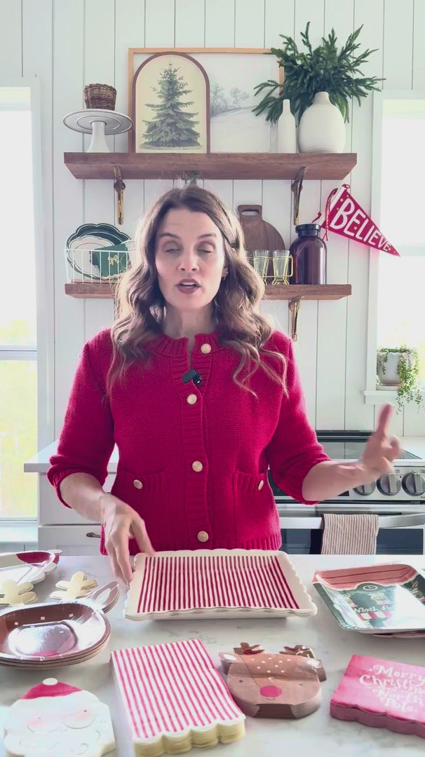 Video showing Santa shaped paper plates with coordinating tableware