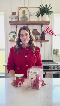 Woman showing Christmas Plaid Paper Cups with Bows