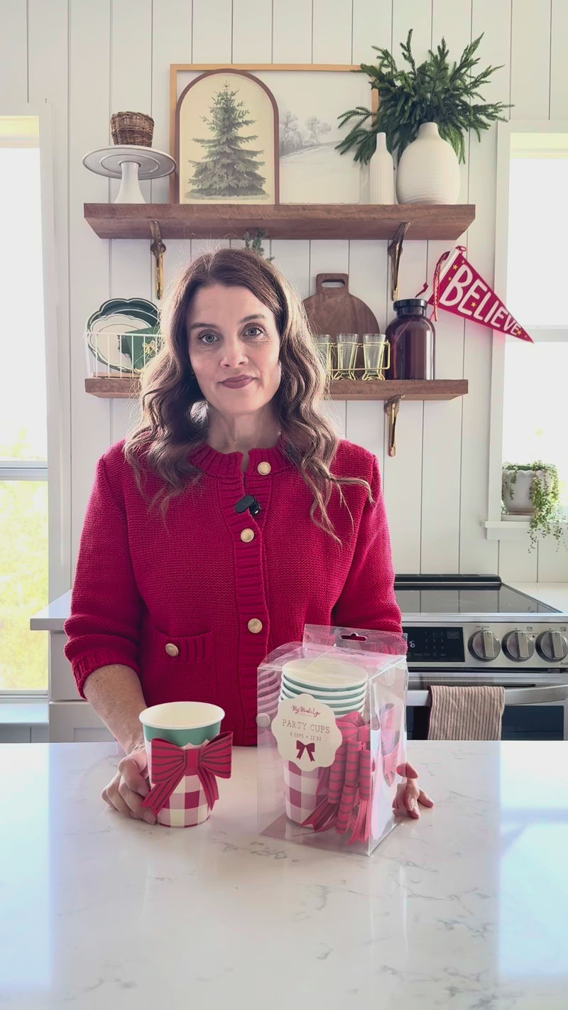 Woman showing Christmas Plaid Paper Cups with Bows