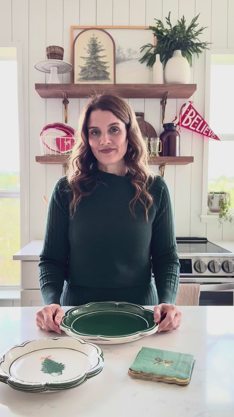 Video demonstration of layering the Evergreen tree plates and coordinating solid green plates, showing the quality of this disposable holiday tableware.