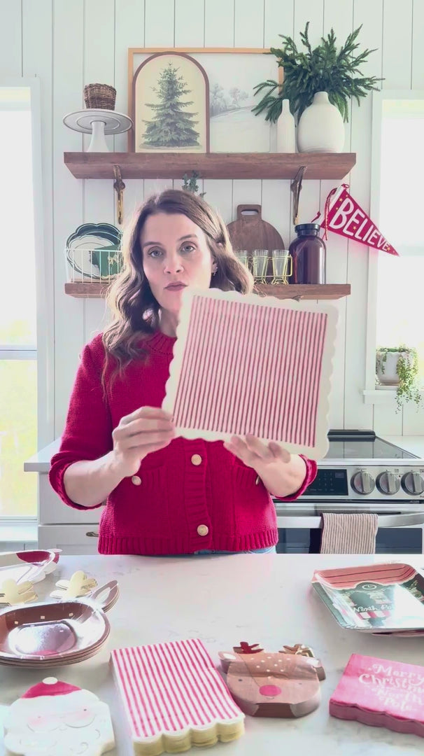 Video showing red striped square paper plates with coordinating products