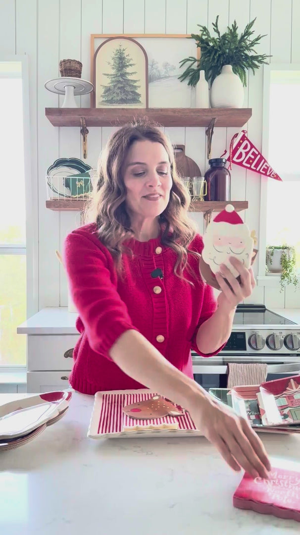 Video showing red Merry Christmas cocktail napkins displayed on a holiday table