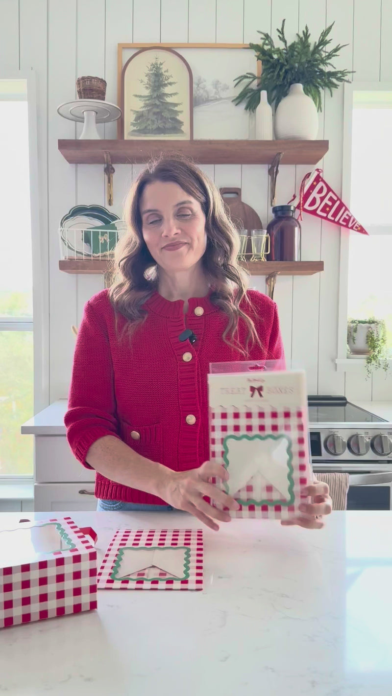 Woman showing Red Gingham Christmas Cookie Boxes