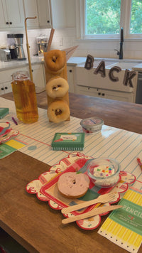 Back-to-school breakfast video featuring themed party plates, napkins, lunchbox treat boxes, and easy ideas for styling a school-themed breakfast table.