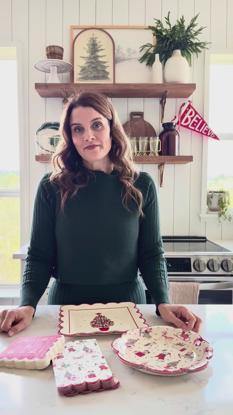 Video demonstrating the size of the Christmas dogs holiday dinner napkins and comparing them to a matching cocktail napkin and plate.