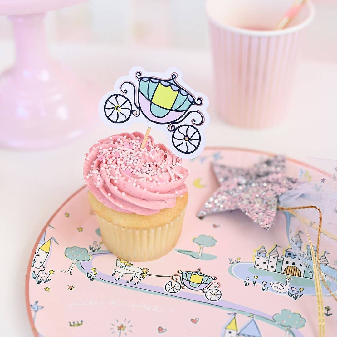 Cupcake served on pink fairytale party plate at princess birthday table