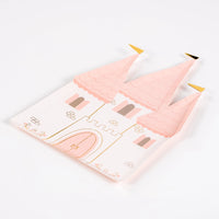 Profile of castle plate highlighting scalloped rooftops and pastel tones.