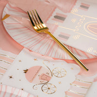 Carriage napkin and castle plate styling—subtle sparkle for tea-time treats.
