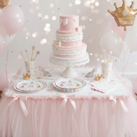 Three-tier pink ruffle cake surrounded by princess cups and wands