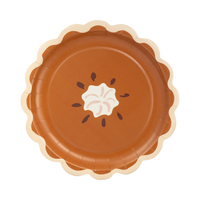 Pumpkin pie slice–shaped paper plate with whipped cream design on a white background.
