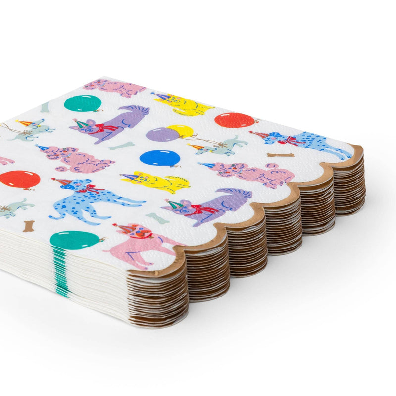 Angled stack of folded Puppy Dog paper napkins showing the gold scalloped edges and the full 20-count depth.