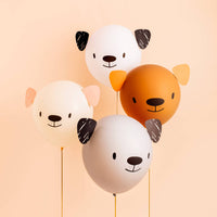 Assembled puppy balloons in neutral colors styled for a dog birthday party