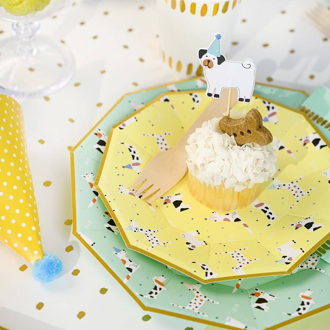 Cupcake displayed on a yellow dog party dessert plate