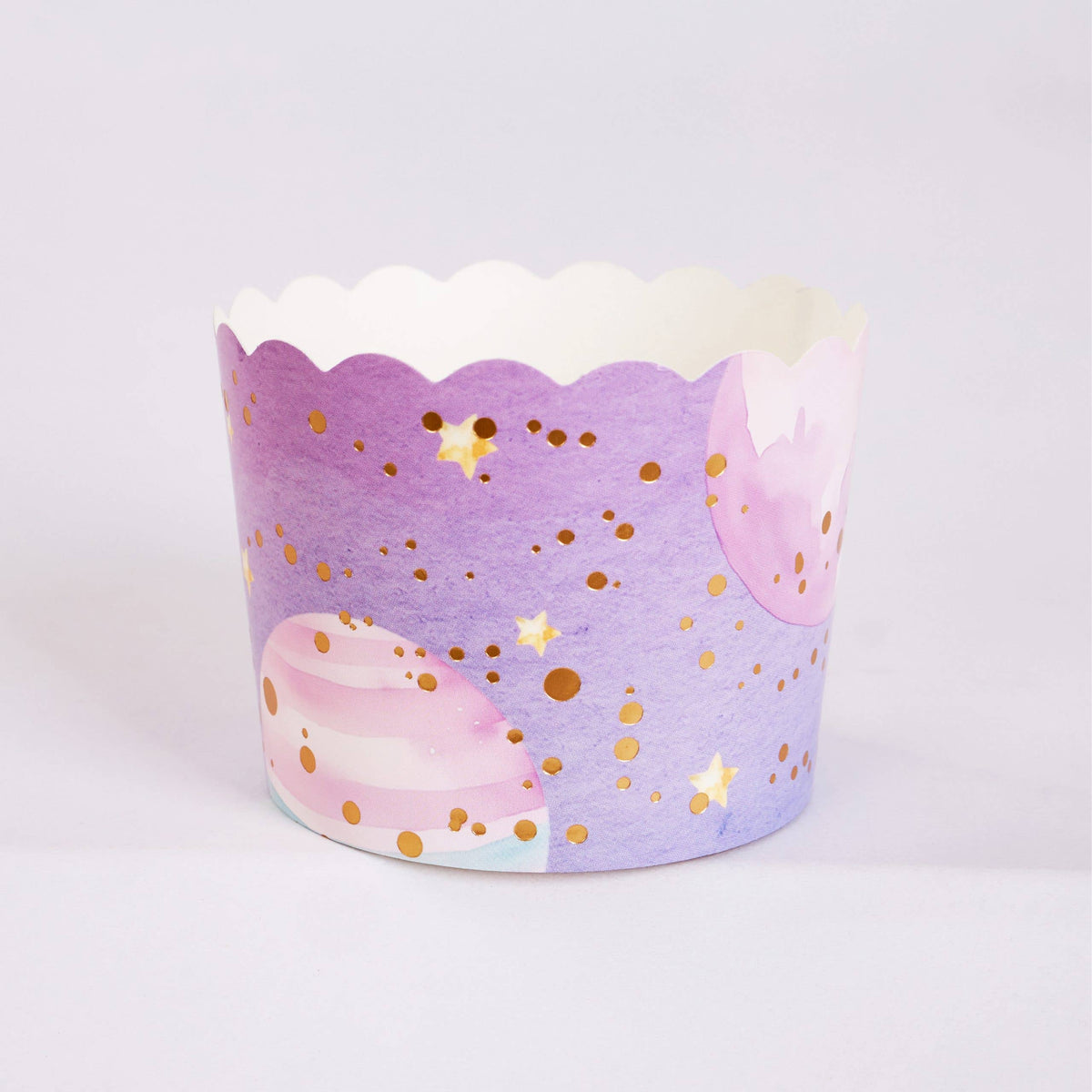 purple galaxy cupcake baking cup with planets and stars design
