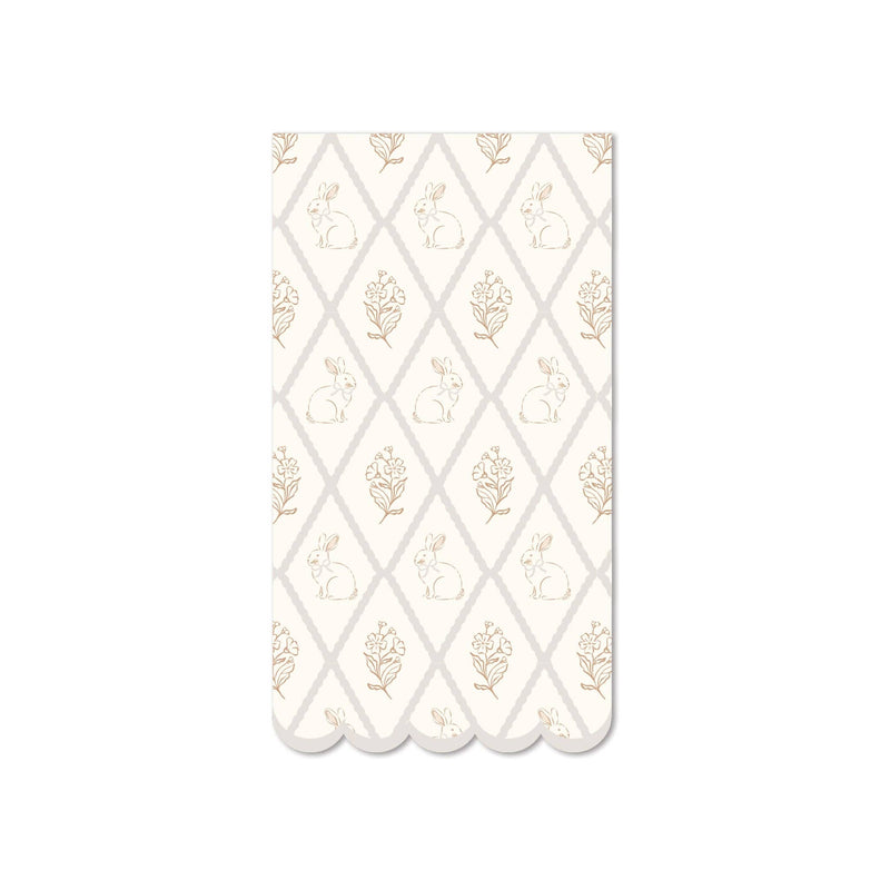 A single paper guest napkin featuring a tan and cream diamond trellis pattern with vintage bunnies and flowers.