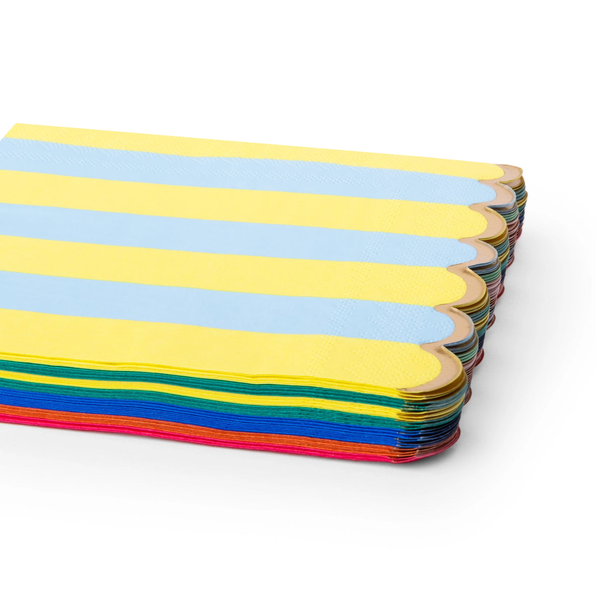 Rainbow stripe scalloped napkins shown folded and stacked at an angle