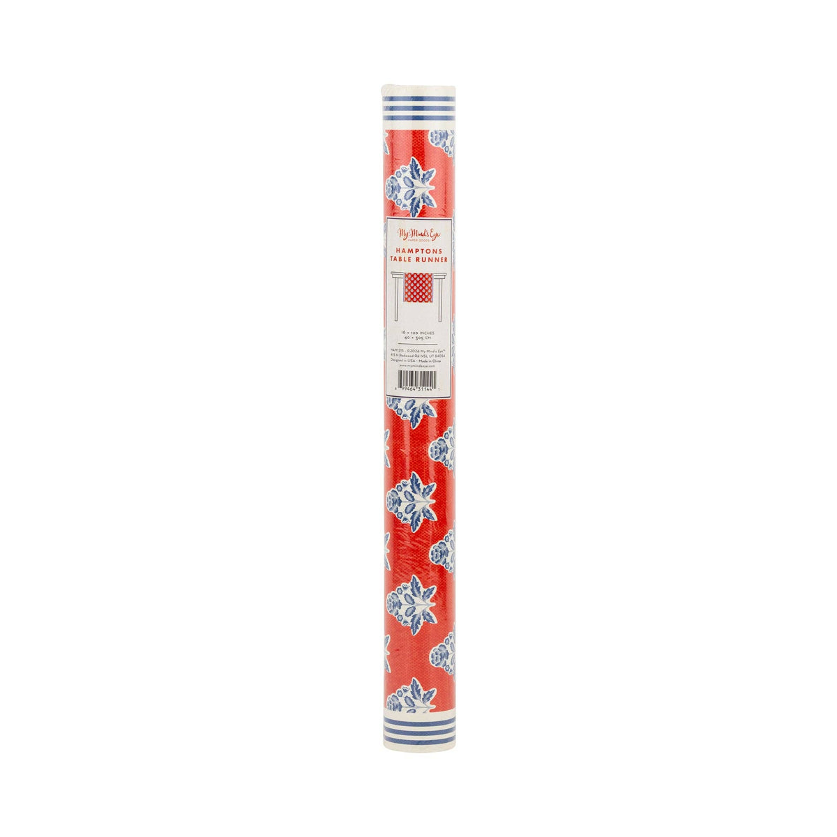 Red block print floral paper table runner in rolled packaging with Hamptons label