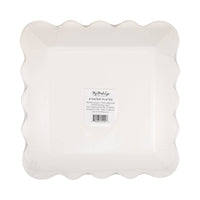Back of red and blue striped scalloped paper plates showing white plate underside with product label and barcode