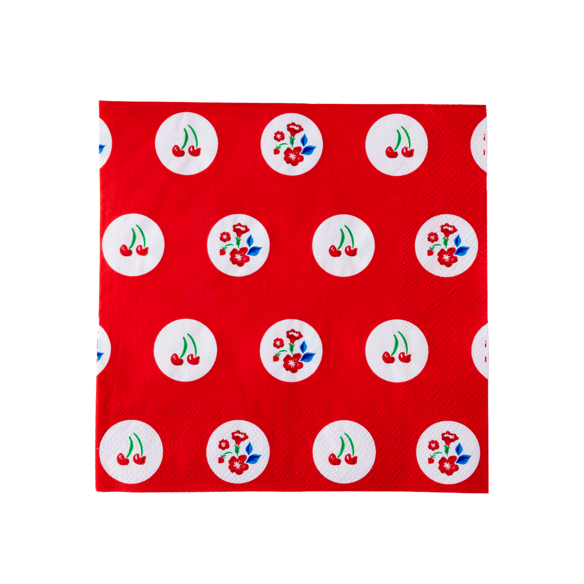 Single red cherry and floral polka dot luncheon napkin flat lay on white background showing full pattern of white circles with cherry and flower motifs