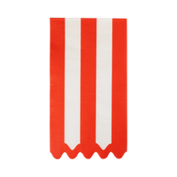 Cream and red striped paper dinner napkin with a wavy red edge, folded, on a white background.