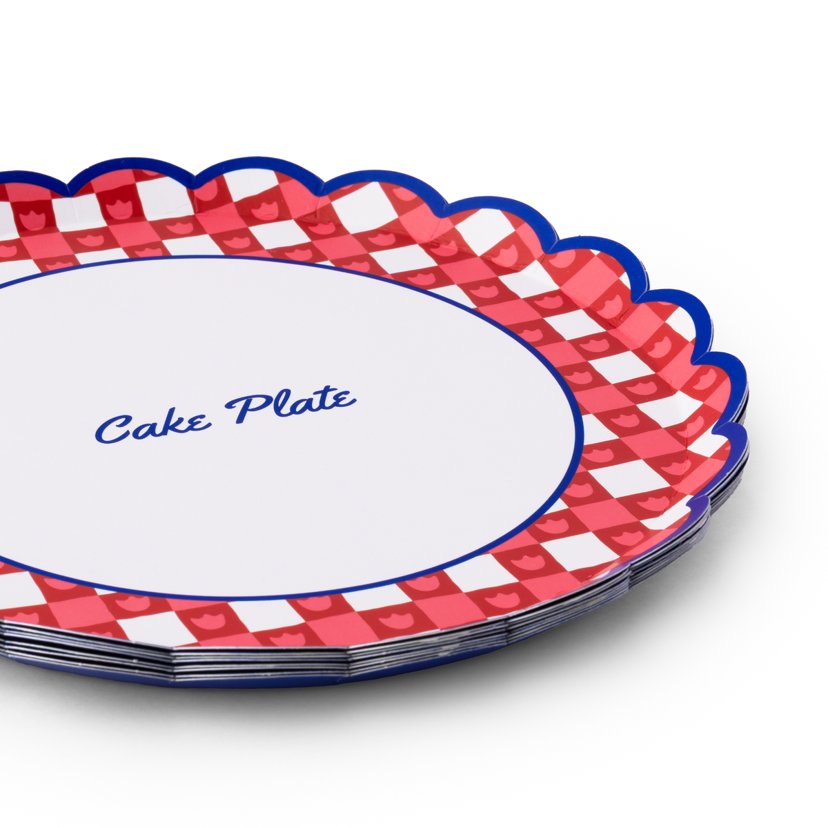 Angled close-up of stacked red gingham cake plate paper plates showing blue script, tulip gingham pattern, and blue scalloped edge