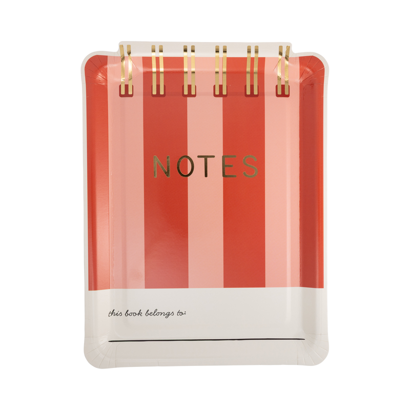 Red and pink striped notebook shaped paper plate with gold foil spiral binding, gold foil "NOTES" title, and "this book belongs to" writing line at bottom