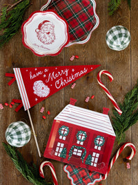 Red Santa felt pennant styled with holiday decor and candy canes