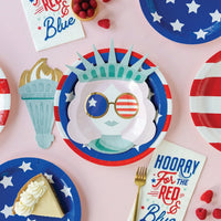 Red striped paper plate with a 10" width measurement line