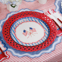 Americana Party Supplies featuring a red latticed charger and a flag-themed dinner plate.
