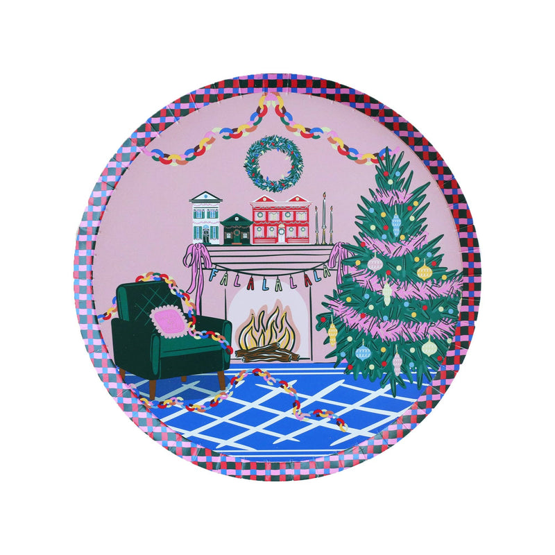 Top-down studio shot of an 8 inch round paper dessert plate featuring a retro Christmas living room scene on a pink background with a colorful plaid border.