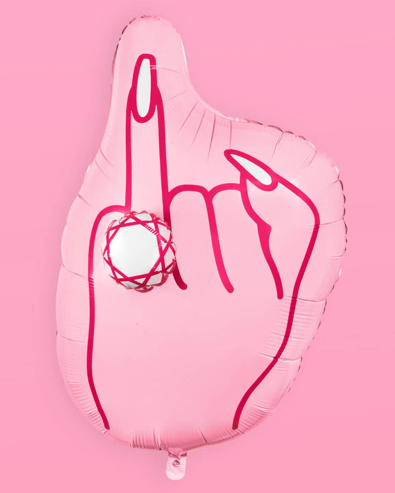 Front view of inflated pink ring finger diamond balloon on pink background showing full hand shape, hot pink line art, and 3D diamond ring