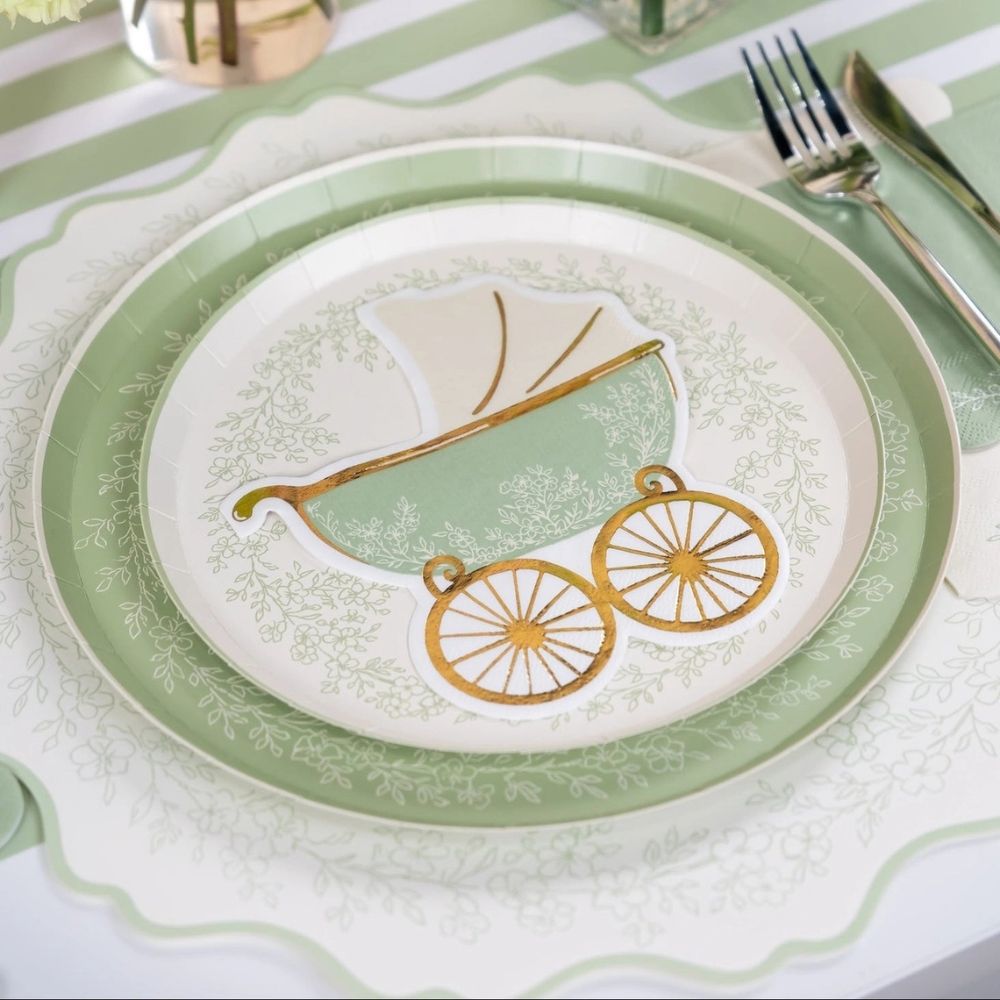 sage baby shower napkin styled on table setting.