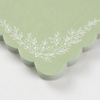 close up of floral illustration on sage cocktail napkin.