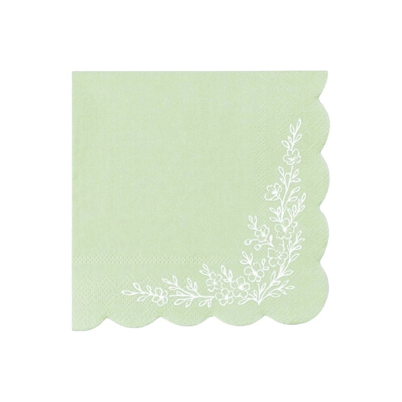sage green cocktail napkin with scalloped edge and floral corner design.