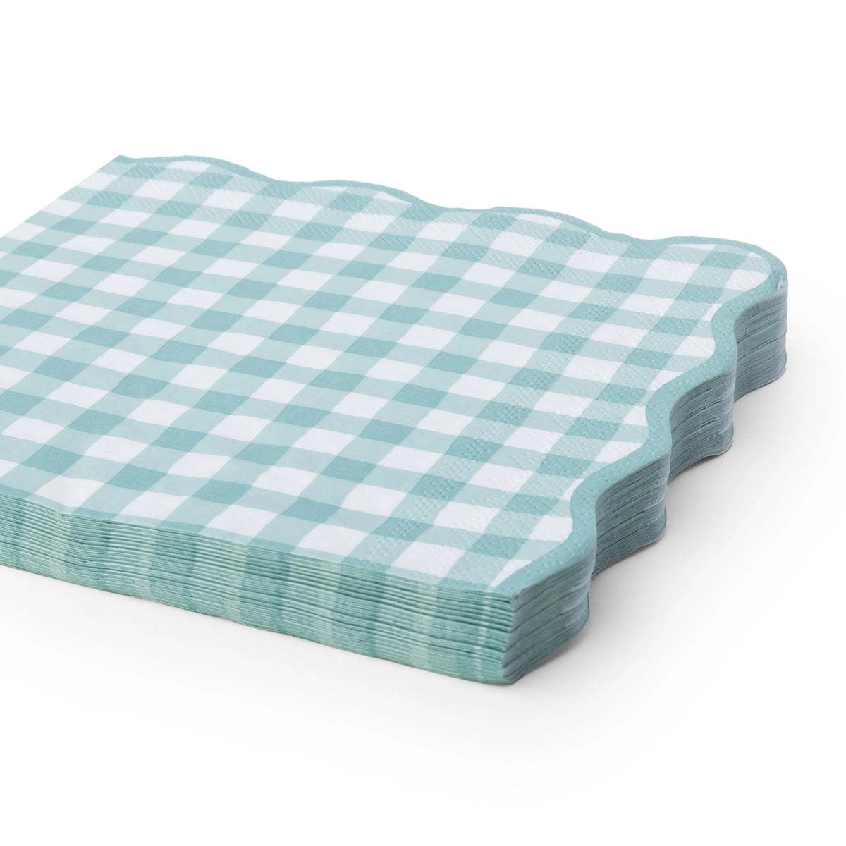 Sage green gingham napkins shown folded and stacked at an angle