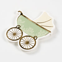 stack of sage baby carriage napkins.