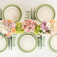 sage party napkins paired with matching disposable plates spring tablescape