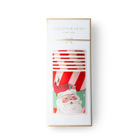 Boxed set of Santa Christmas cups in a white Bonjour Fête package with a gold bow and Santa artwork on the front.