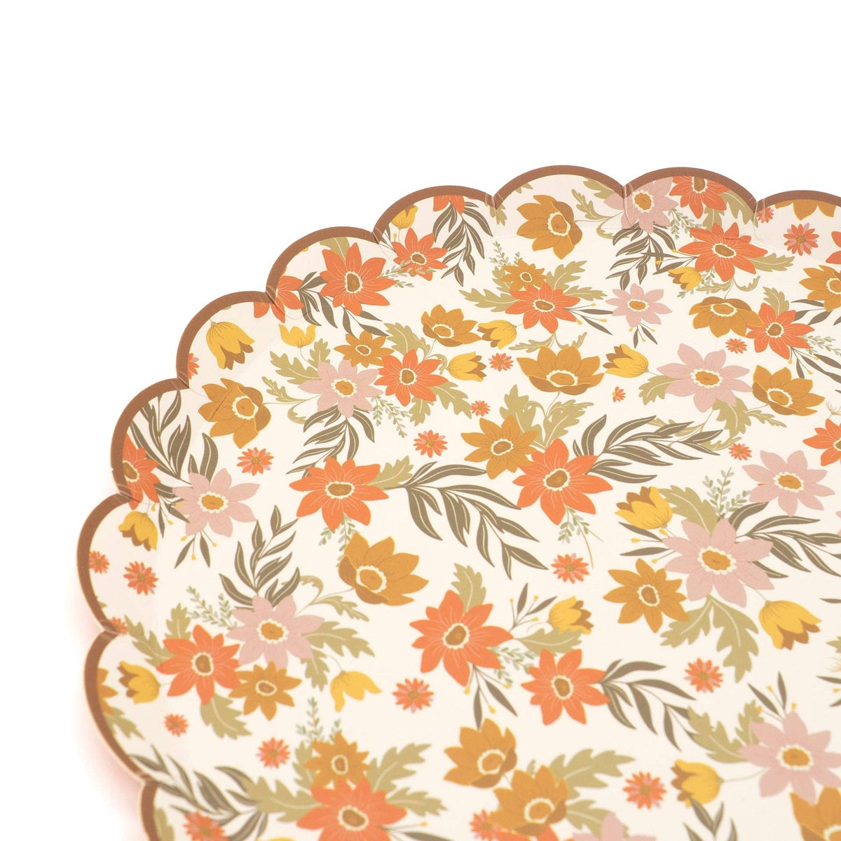 Corner detail of the brown scalloped rim and dense fall floral print