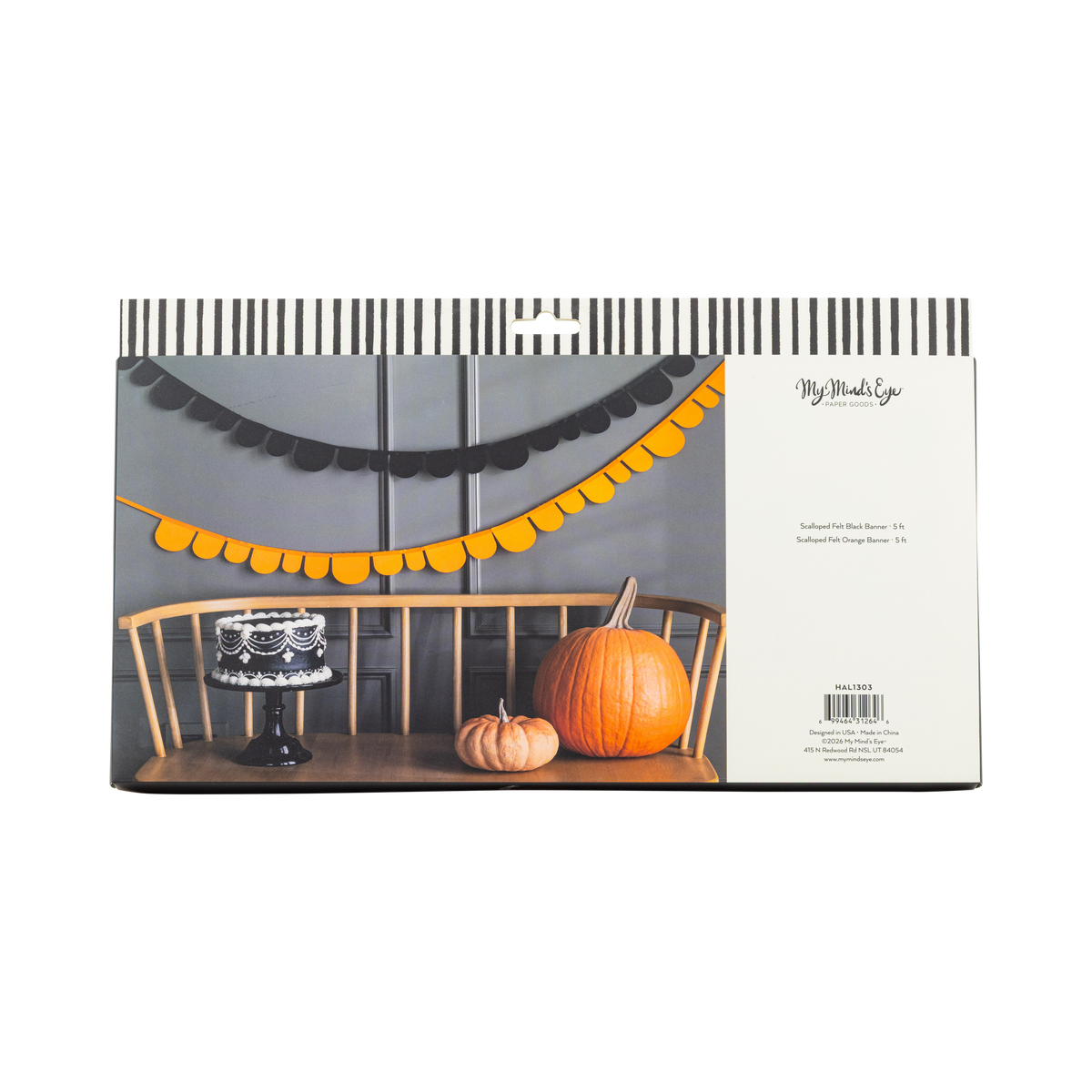 Product packaging of Orange & Black Felt Banner with other Halloween-themed decor including pumpkins and a cake stand.