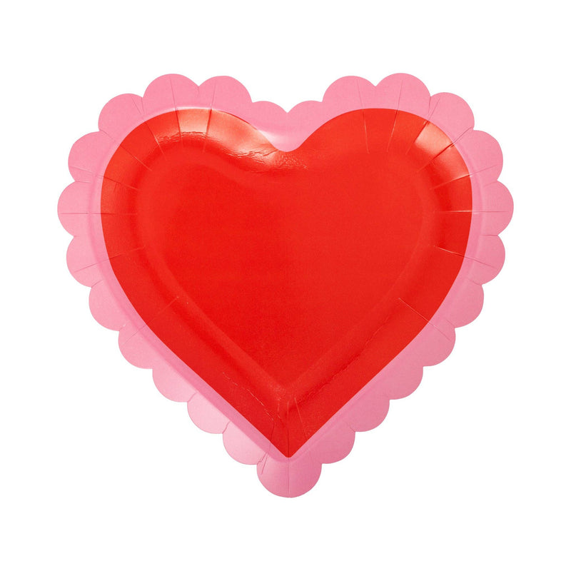 Scalloped heart shaped paper plate in red with pink border
