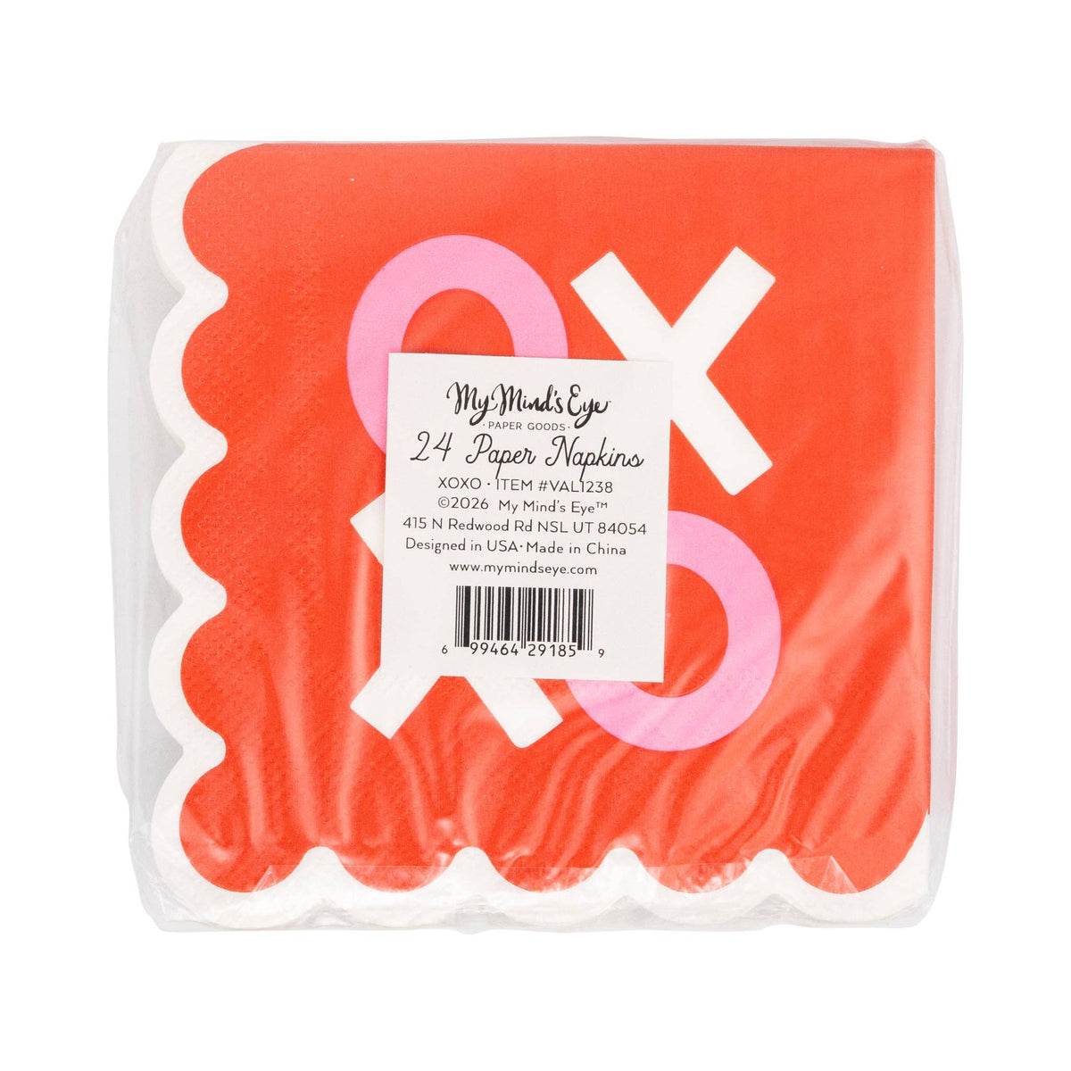 Stack of scalloped XOXO napkins with red, pink, and cream design