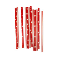 Close-up of the Believe Reusable Straws in red and white stripes, included in the Christmas Party Kit