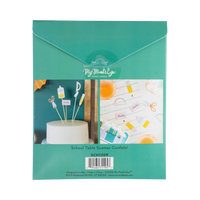 Back of school supplies confetti packaging showing styled photos of confetti scattered on notebook paper tablescape and used as cake toppers