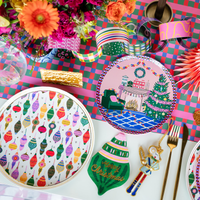 Overhead Season of Cheer tablescape showing the ornament napkins with patterned plates, florals, and vibrant holiday décor.