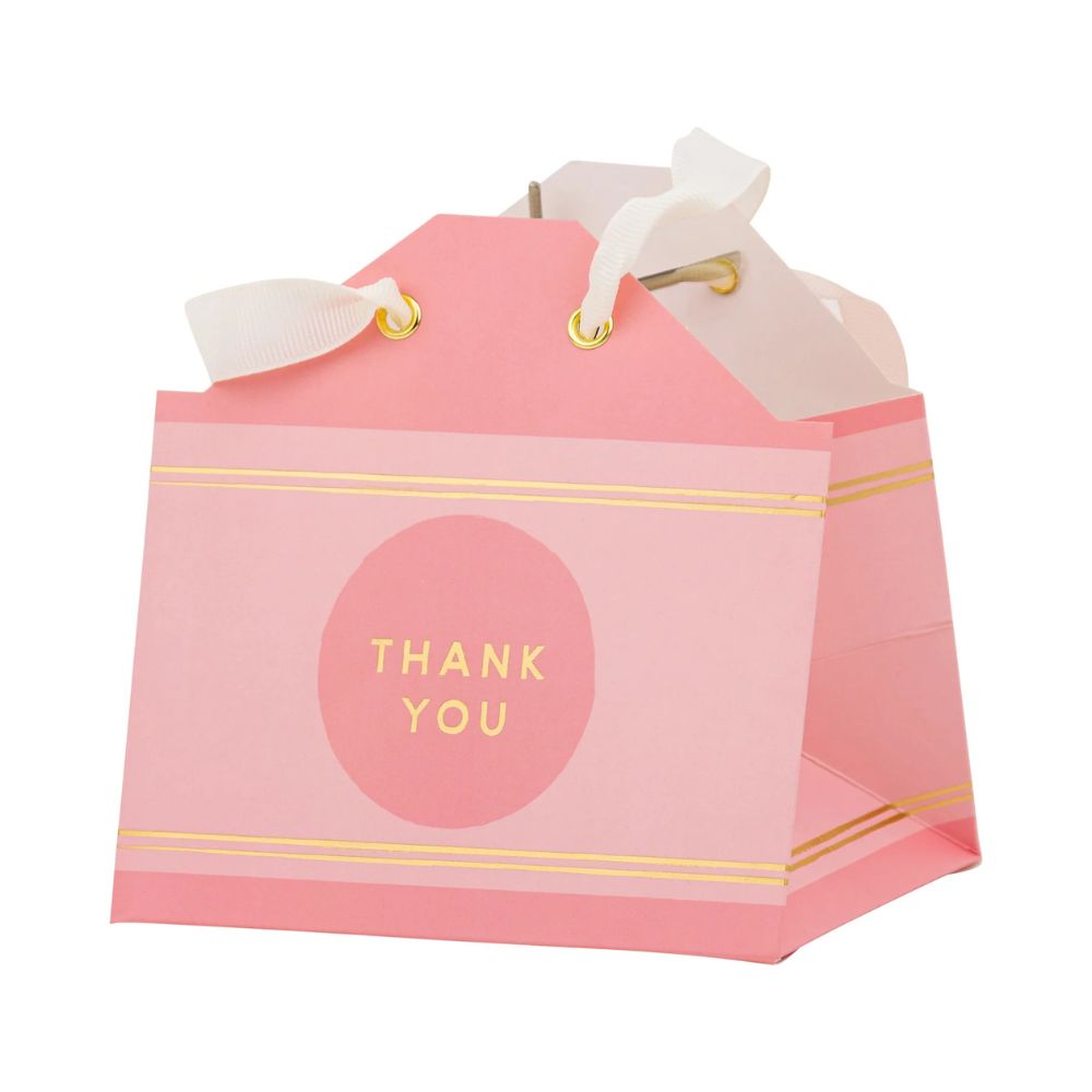 Set of six mini crayon gift bags perfect for classroom treats, birthday favors, and back to school celebrations, featuring the pink bag.