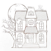 Overhead view of a shaped white paper coloring placemat cut into the silhouette of a haunted house featuring line art of ghosts and a witch.