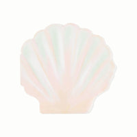 shell shaped napkin in blush and ivory on white background.