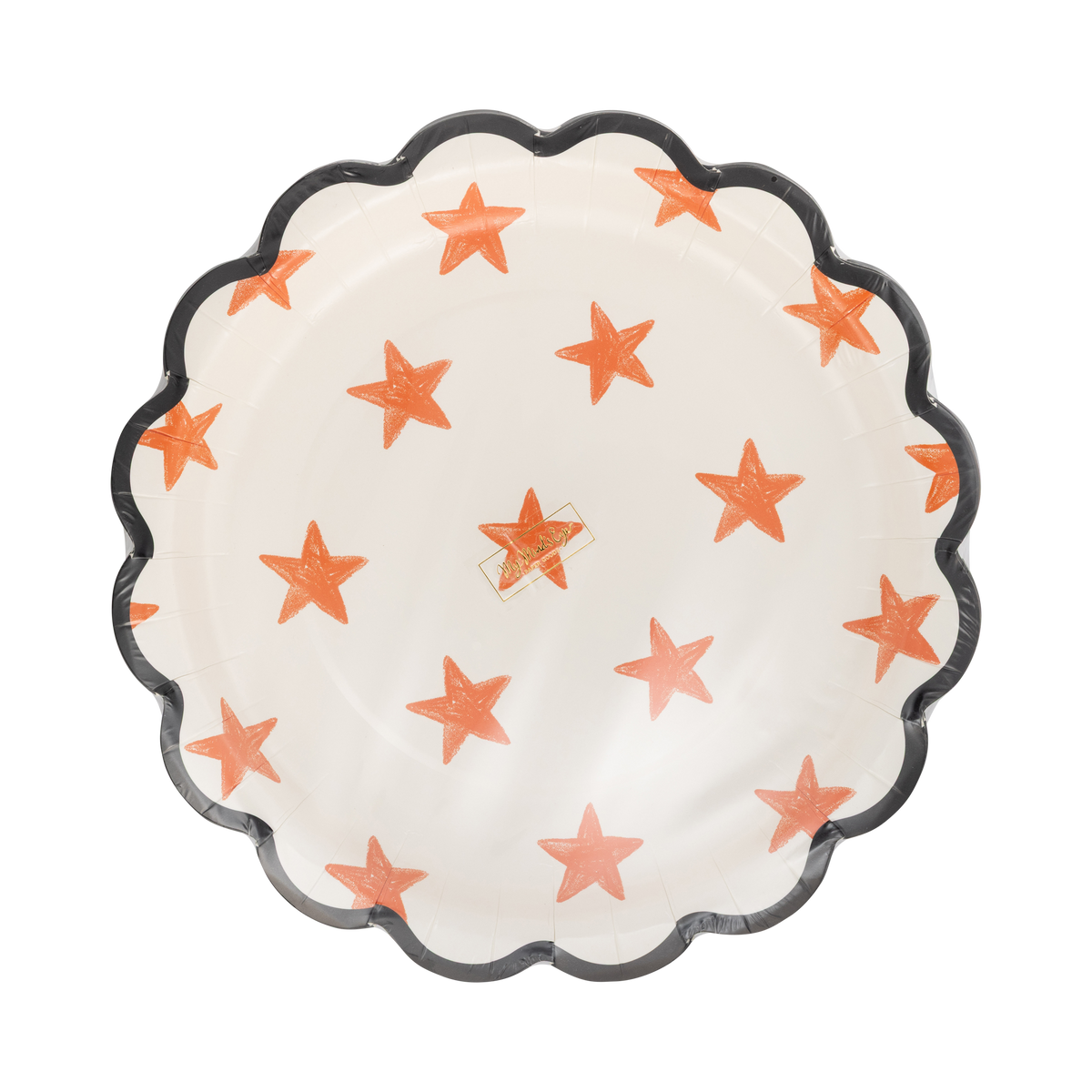 Decorative paper plate with star pattern on a clear packaging.